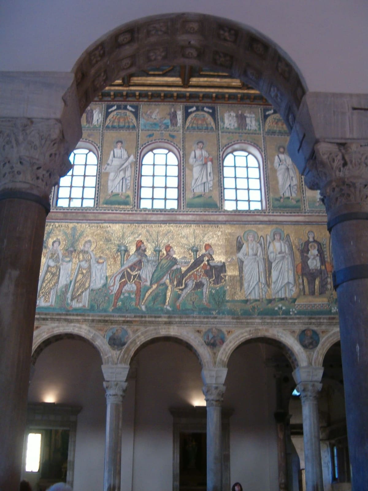the three Magi bringing their gifts to the Madonna and Child among the angels, in Sant'Apollinare Nuovo