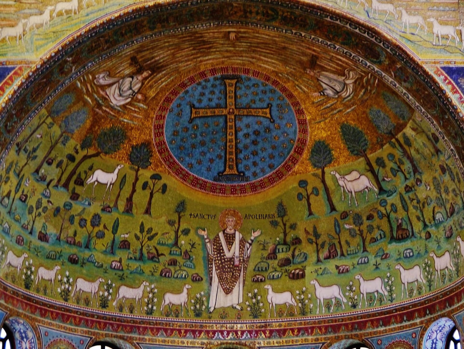 Sant'Apollinare in prayer among the lambs beneath the cross, in the apse vault of the basilica at Classe