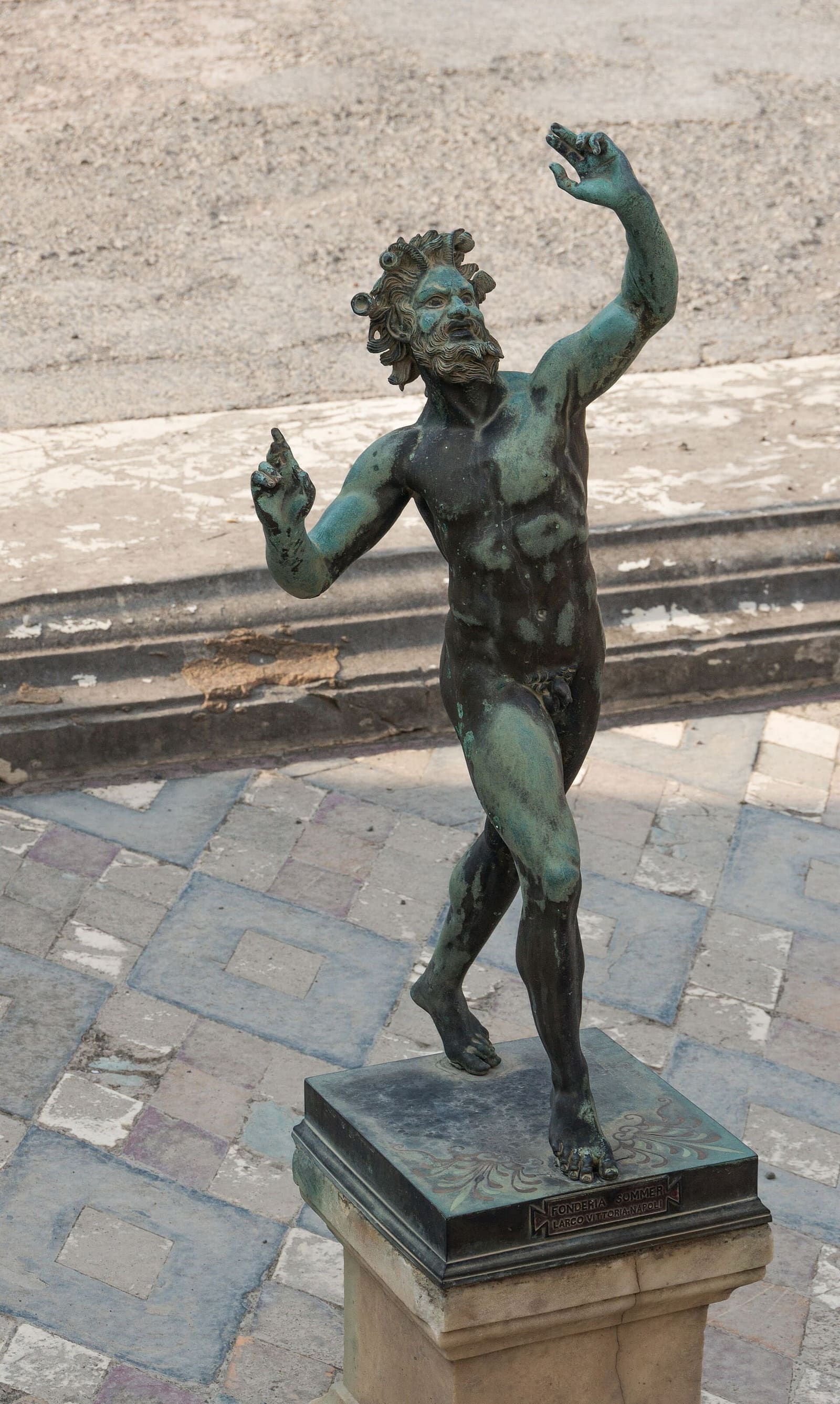 the copy of the Dancing Faun in the atrium of the Casa del Fauno