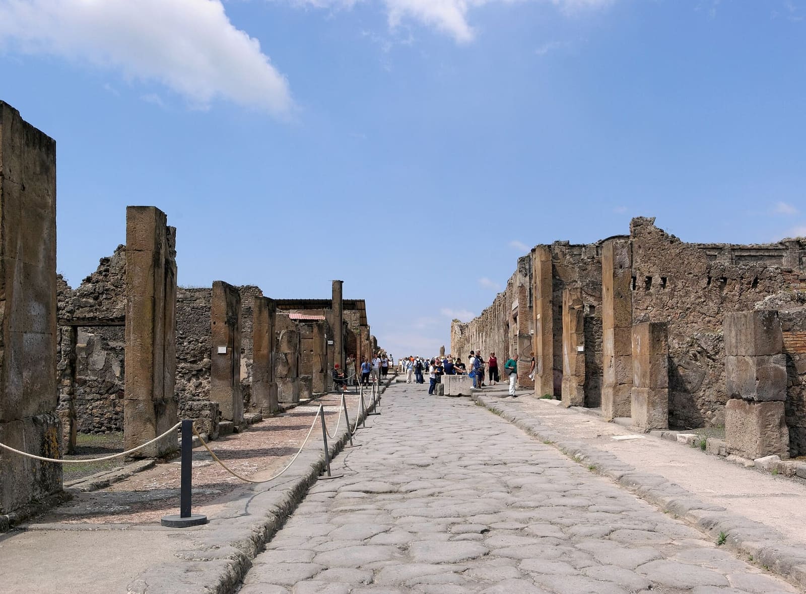 via dell'Abbondanza, with its high pavements and the fronts of the shops