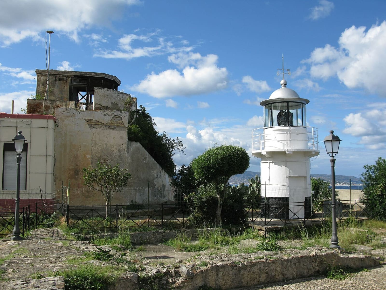 the white lighthouse on the castle terrace