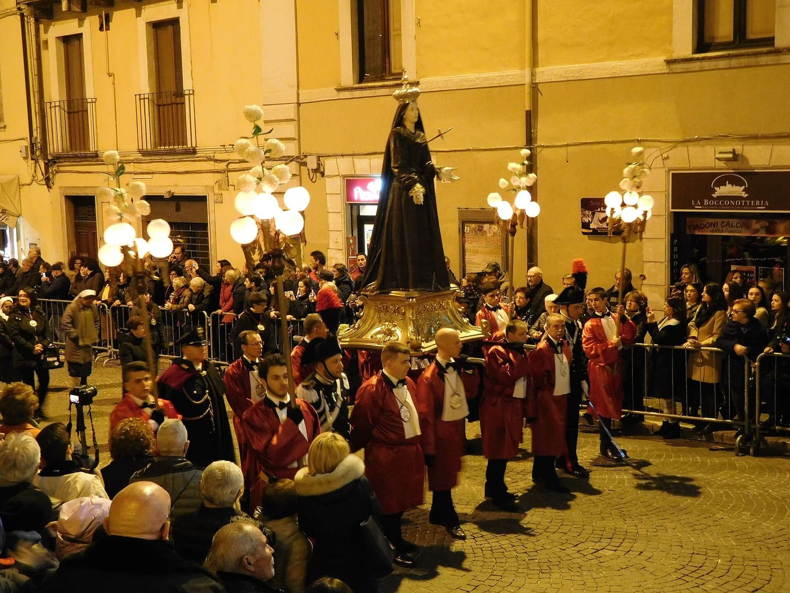 the brothers of the Trinità, in red, in the Good Friday procession of 2018